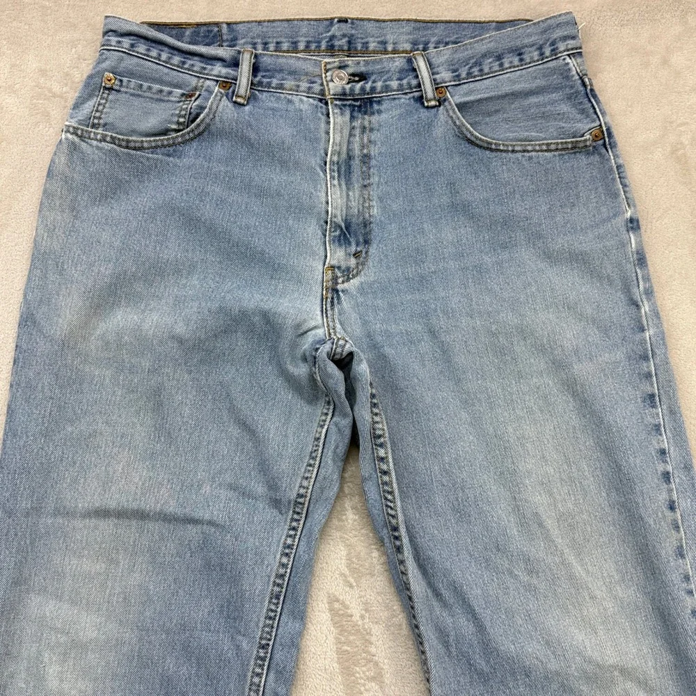 Levi's 550 Relaxed Fit Jeans Mens 36x34 Light Wash Blue Denim Tapered Leg Baggy